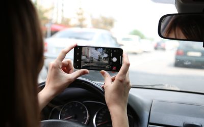 The Impact of Distracted Driving on Insurance and Safety